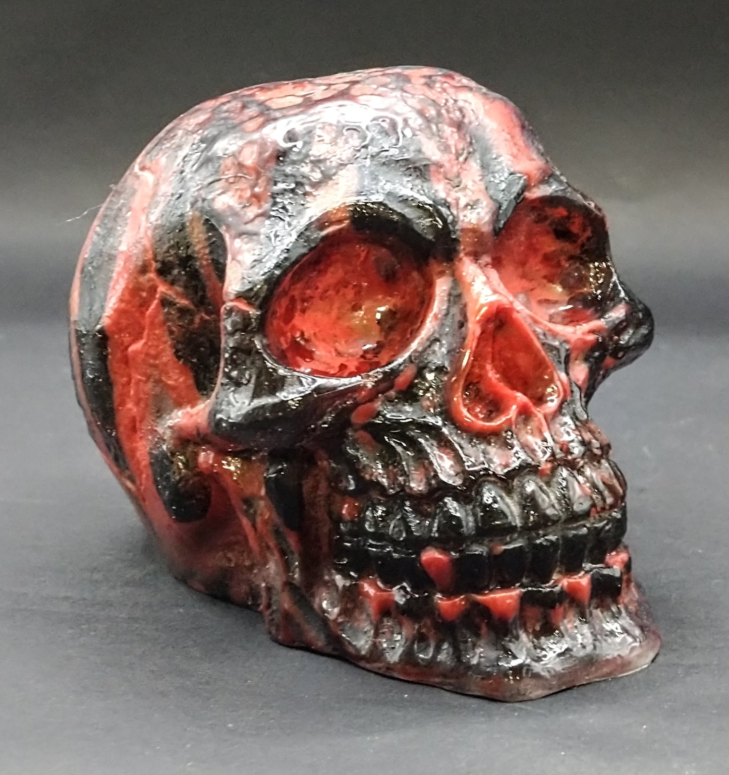 Underworld. Resin skull and resin cube.