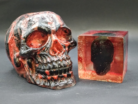Underworld. Resin skull and resin cube.